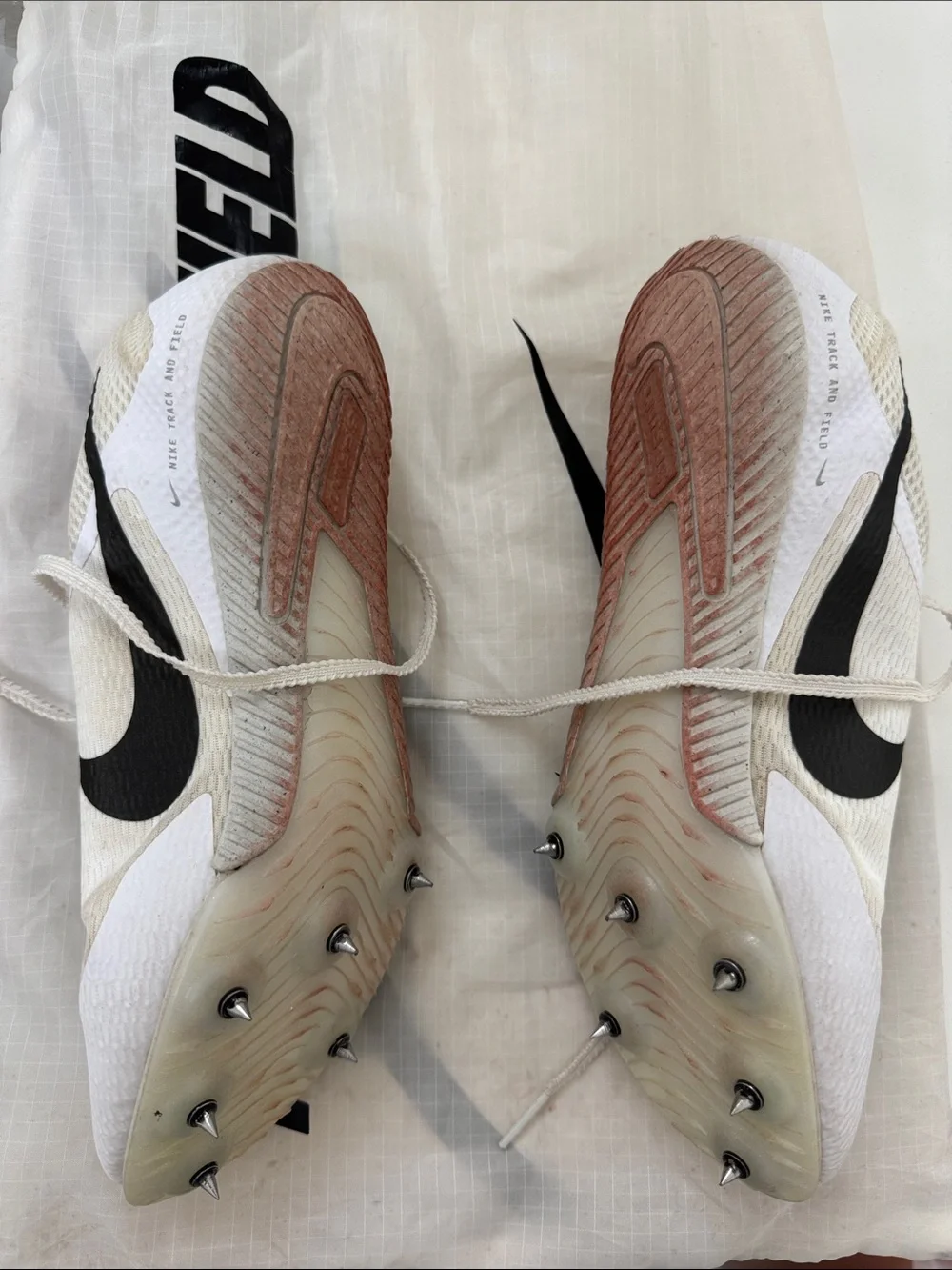 Nike Cream and Black Track Spikes
